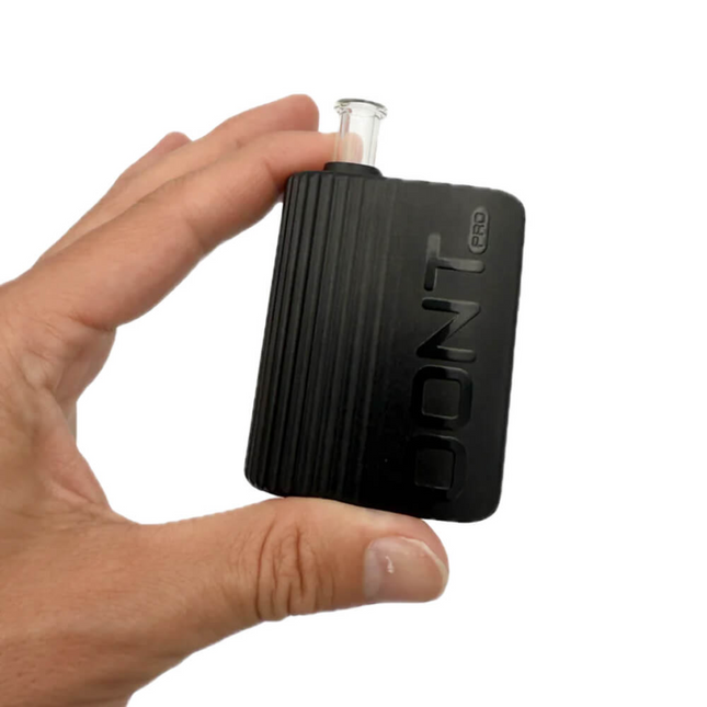 Hand holding a black xvape oont pro with 'OONT' branding on a white background